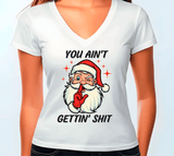 White t-shirt with a graphic of a cartoon character wearing a Santa hat and text on a white background