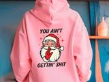 Pink hoodie with a graphic of Santa Claus and text on a blue background