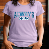Person wearing a purple t-shirt with 'ALWAYS COLD' text in blue and white.