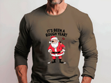 Brown long-sleeve shirt with Santa Claus graphic and text 'It's Been a Rough Year!' on a plain background