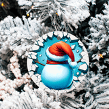 Decorative snowman ornament with a Santa hat on a snowy tree background
