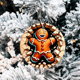 Decorative gingerbread man ornament on a snowy tree branch