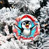 Decorative Christmas ornament with a penguin design hanging on a snow-covered tree.