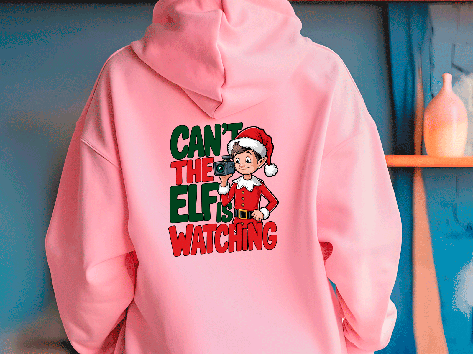 Pink hoodie with Christmas-themed design on a blue background