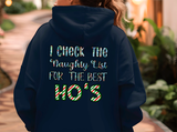 Navy blue hoodie with humorous text on the back, worn by a person outdoors.