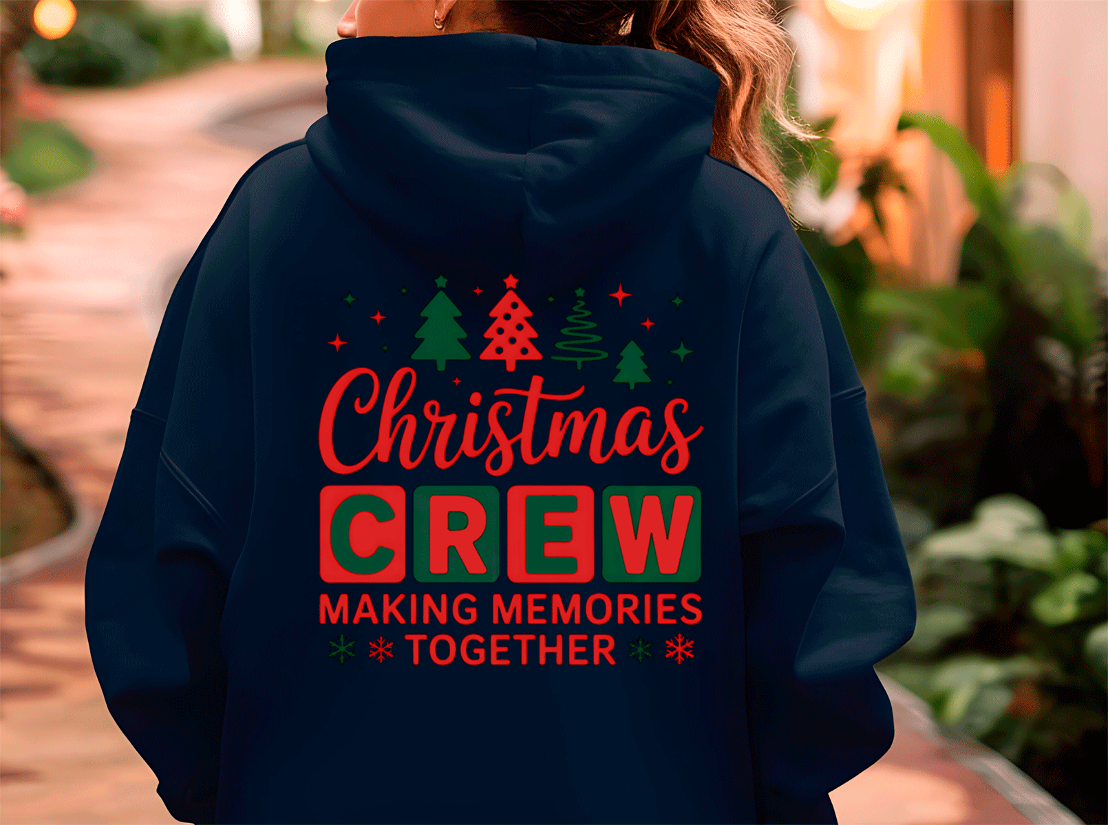 Navy blue hoodie with 'Christmas Crew Making Memories Together' text and Christmas tree graphics on the back.