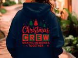Navy blue hoodie with 'Christmas Crew Making Memories Together' text and Christmas tree graphics on the back.