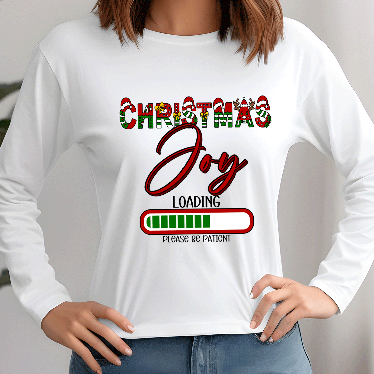 White long-sleeve shirt with 'Christmas Joy Loading' text design on a plain background