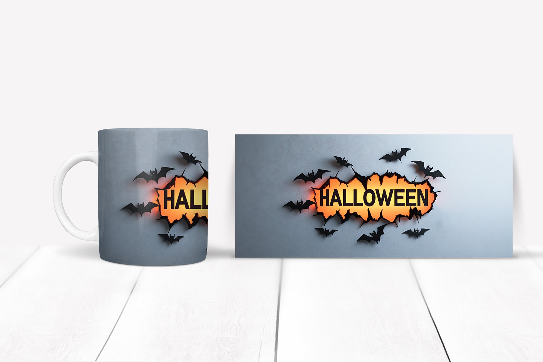 Halloween-themed mug set with 'HALLOWEEN' design on a white surface.