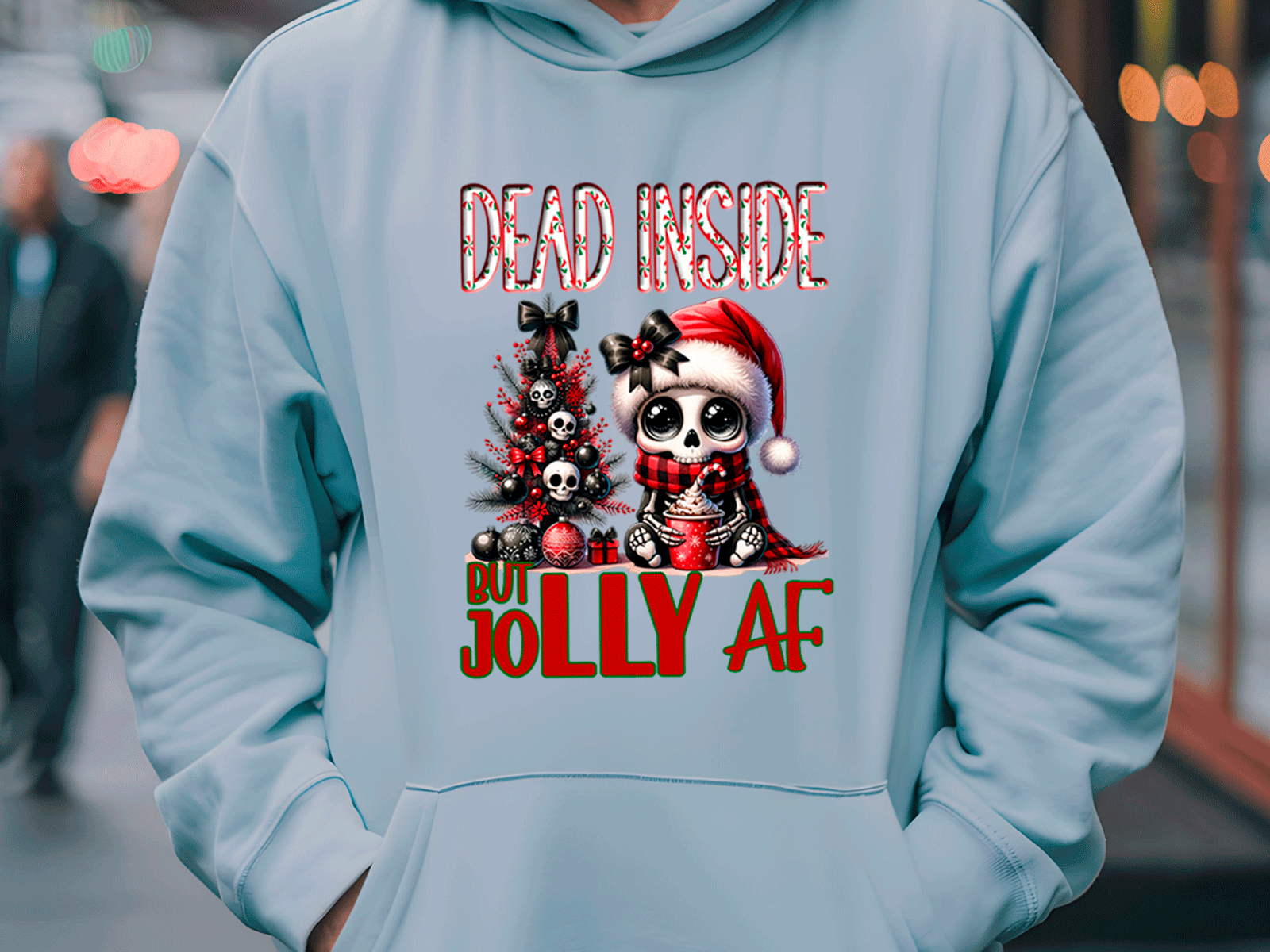 Light blue hoodie with Christmas-themed design and text