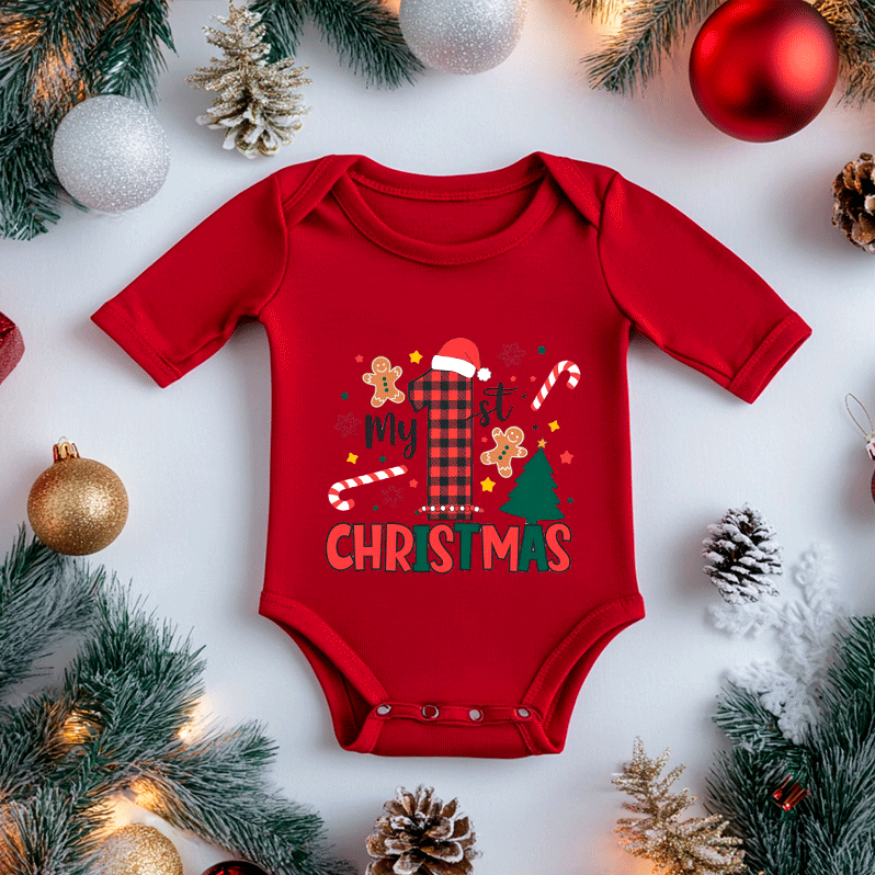 Red baby onesie with 'My 1st Christmas' text surrounded by holiday decorations on a white background