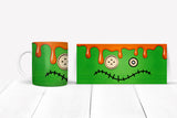 green mug with a monster face design on a white background