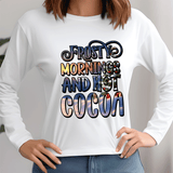 White sweatshirt with colorful text 'Frosty Morning and Hot Cocoa' worn by a person.
