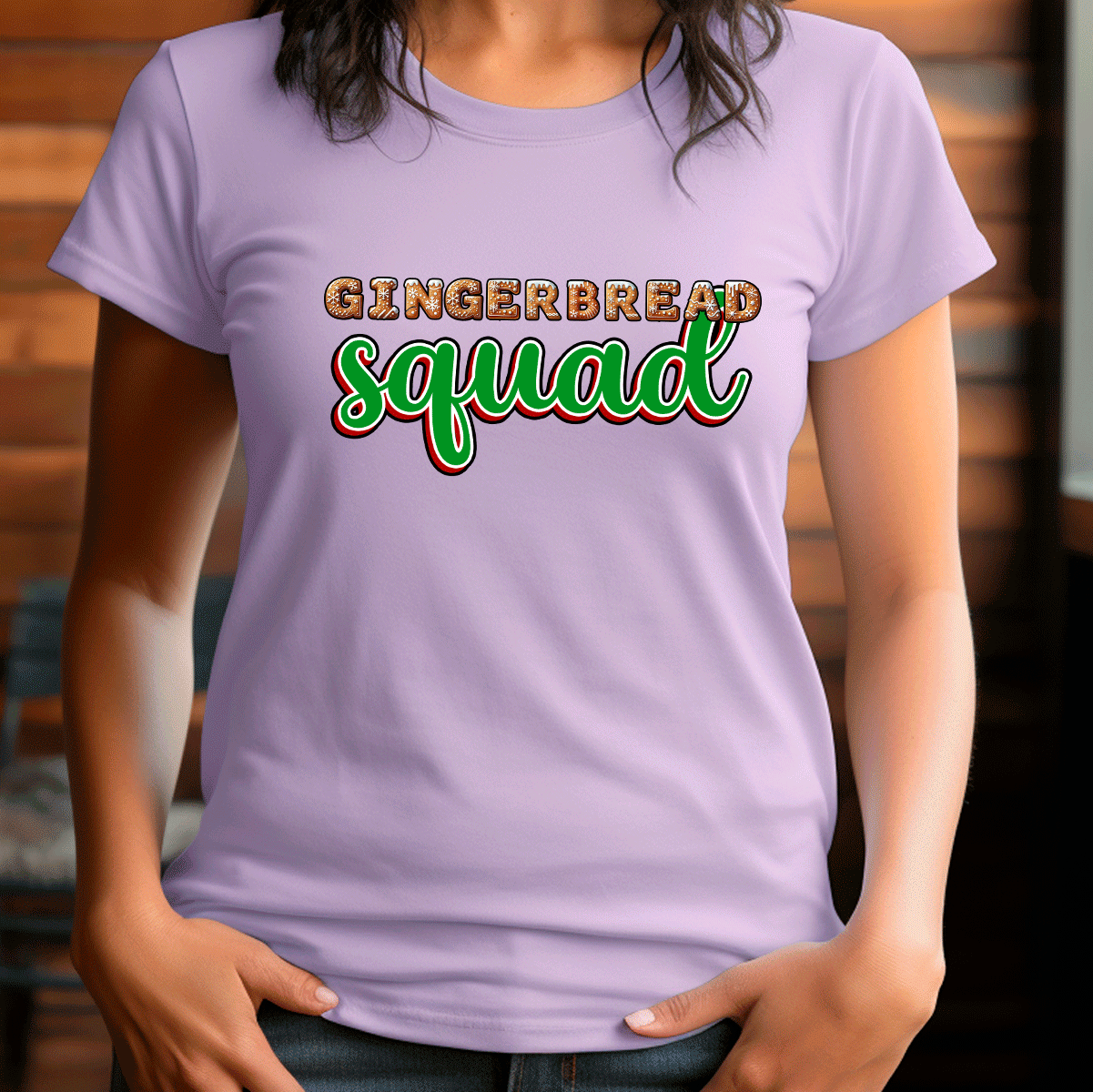 Person wearing a purple t-shirt with 'Gingerbread Squad' text