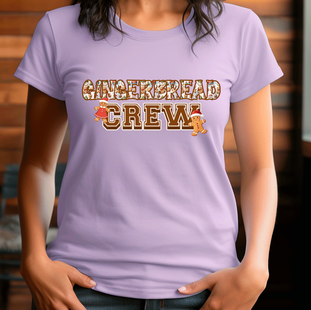 Person wearing a purple t-shirt with 'GINGERBREAD CREW' text and gingerbread men graphics.