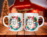 Two mugs with 'Holiday Magic' design on a wooden surface with festive background