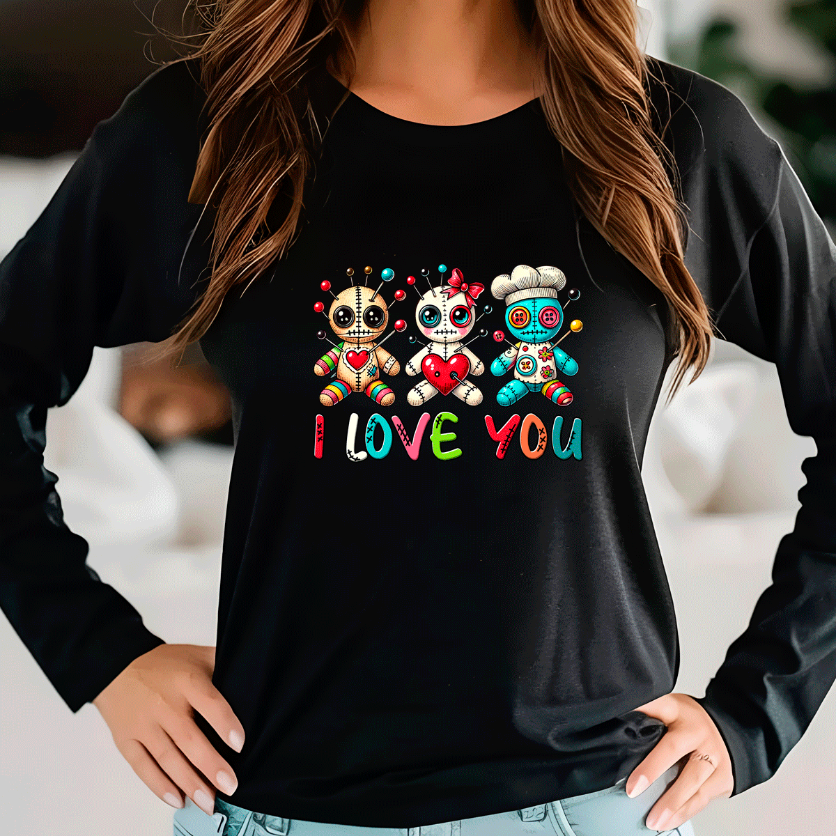 Black sweatshirt with colorful skeleton design and 'I LOVE YOU' text worn by a person.