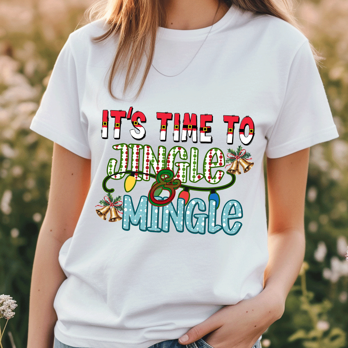 Person wearing a white t-shirt with 'It's time to jingle and mingle' text and festive graphics.