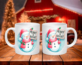 Two Christmas-themed mugs with a snowman design and 'Merry & Bright' text on a wooden table.
