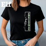 Person wearing a black t-shirt with 'Merry Christmas' design.