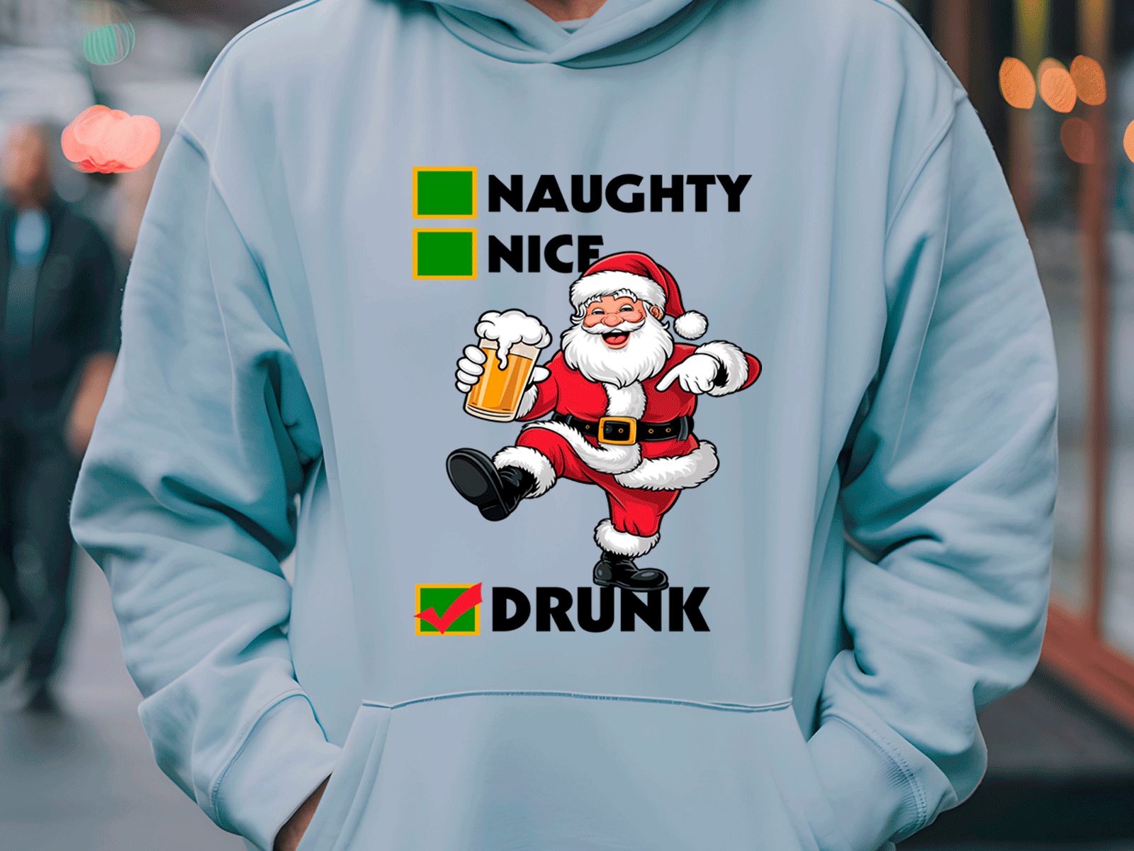 Light blue hoodie with a cartoon Santa Claus graphic and text on a blurred street background