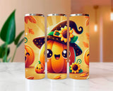 Three Halloween-themed tumblers with pumpkins, leaves, and a witch hat on a marble surface.
