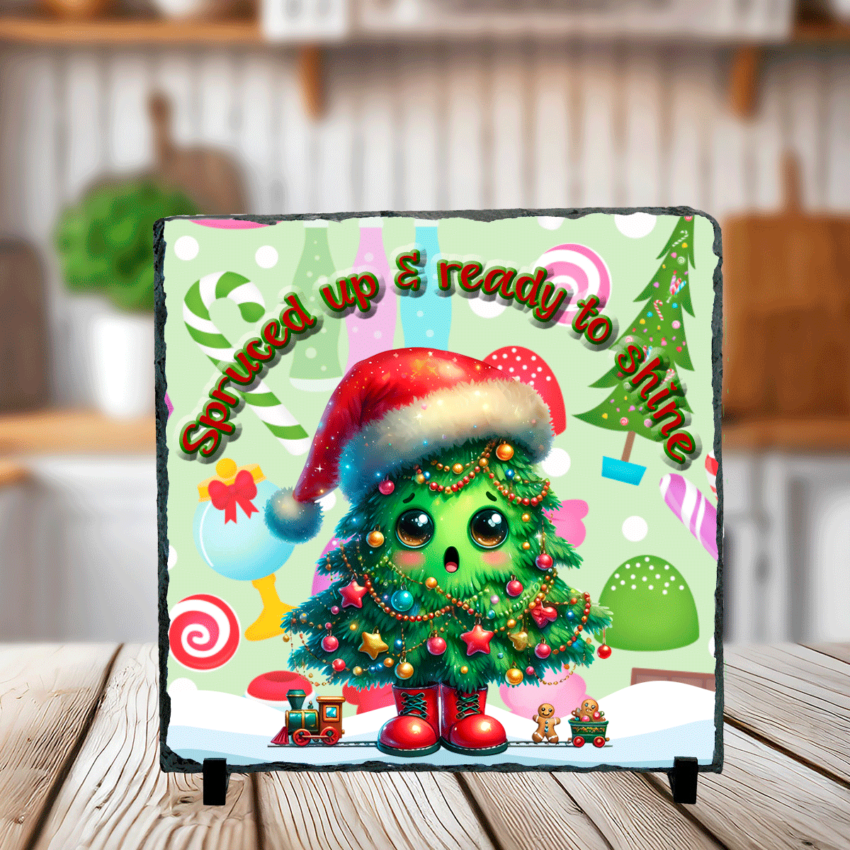 Decorative plaque with a Christmas tree design and festive text on a stand.