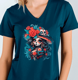 Person wearing a teal t-shirt with a colorful skull design.