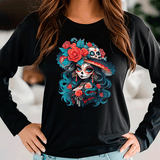 Black long-sleeve shirt with a colorful skull and floral design worn by a person.