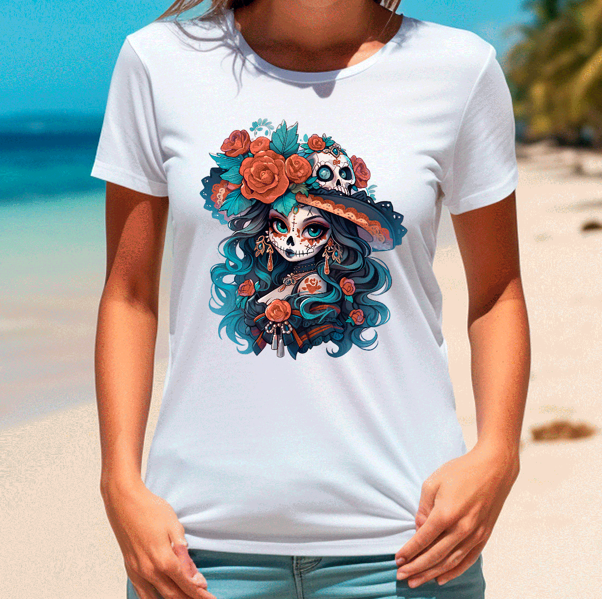 Person wearing a white t-shirt with a colorful skull and floral design on a beach.