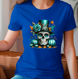 Person wearing a blue t-shirt with a colorful skull design featuring flowers and pumpkins.