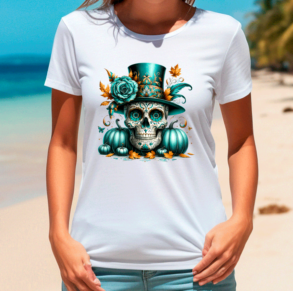 Person wearing a white t-shirt with a colorful skull design on a beach.
