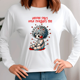 White long-sleeve shirt with a cartoon voodoo doll design and text on a plain background
