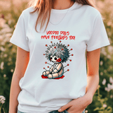Person wearing a white t-shirt with a cartoon voodoo doll graphic and text.
